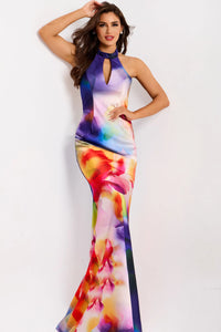 Woman wearing a colorful tie-dye dress on a white background