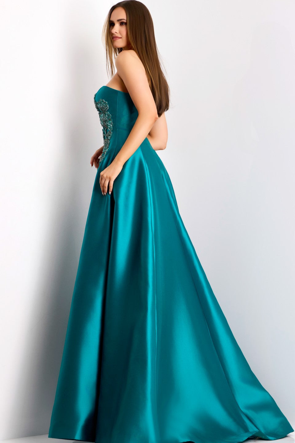 Model wearing Jovani 44352 strapless evening gown with embellished bodice and flowing A-line skirt.