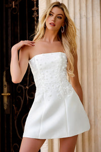 Model wearing Jovani 44855 A-line mini dress with beaded embroidery and 3D appliqué.