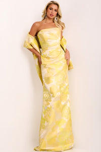 Model wearing Jovani 45289 strapless floral column gown with straight neckline, high slit, and matching drape.