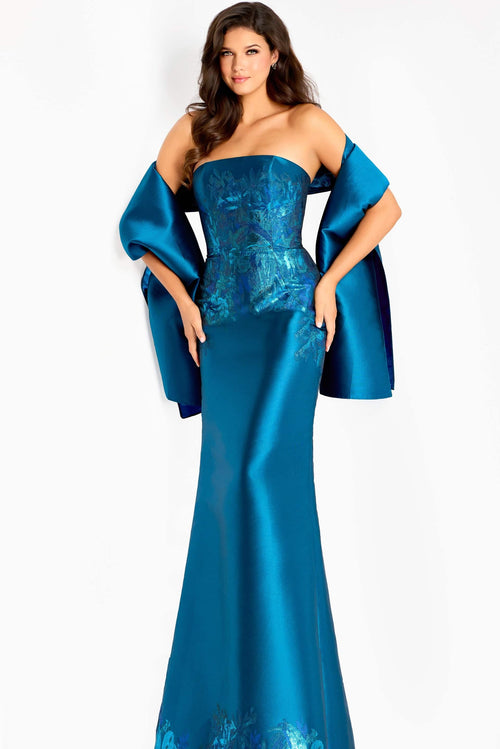 Model wearing Jovani 45577 strapless mermaid gown with a matching wrap, fitted silhouette, detailed bodice, and sweep train.