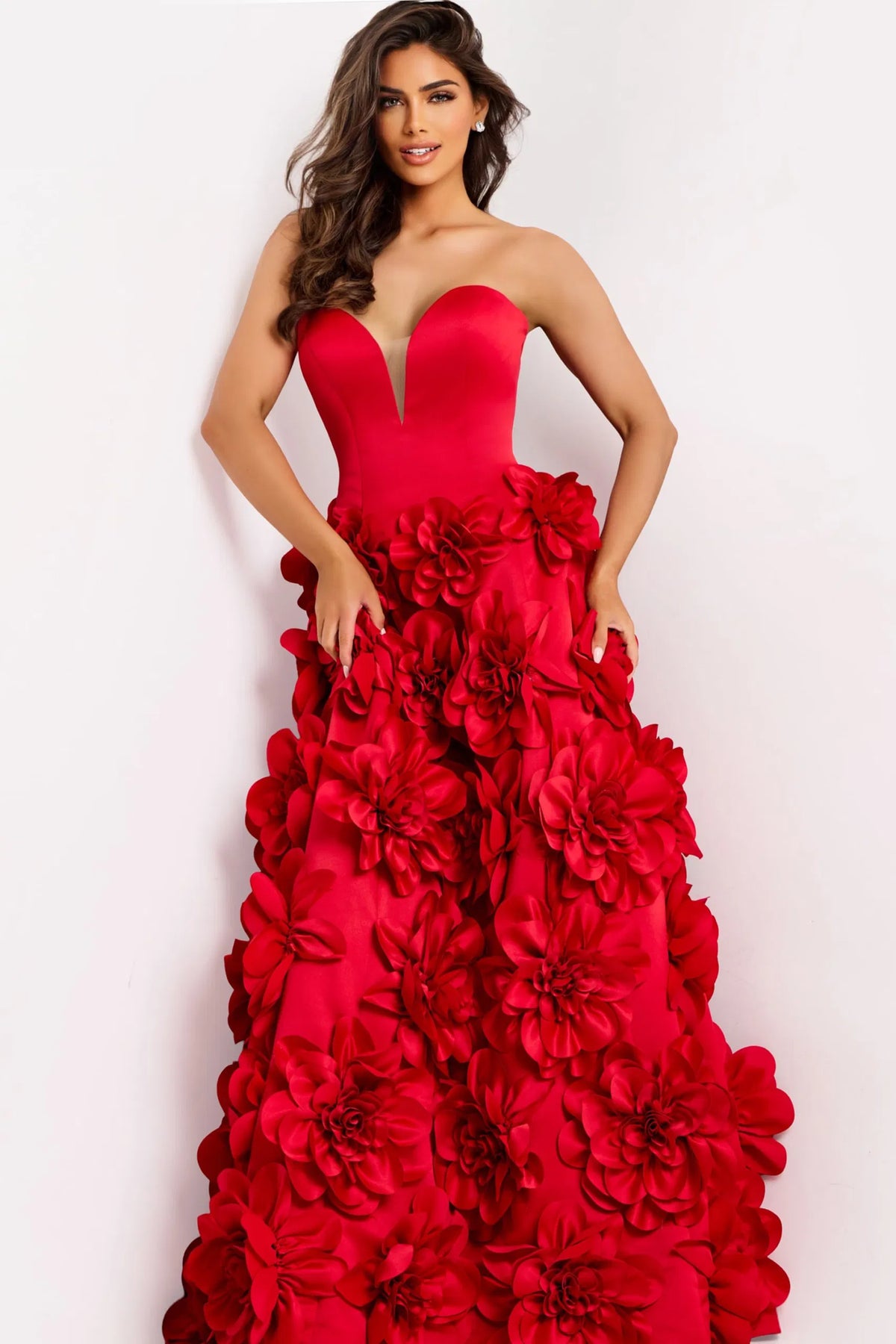 Model wearing Jovani 45661 strapless ball gown featuring a sculpted bodice and dramatic 3D floral skirt.