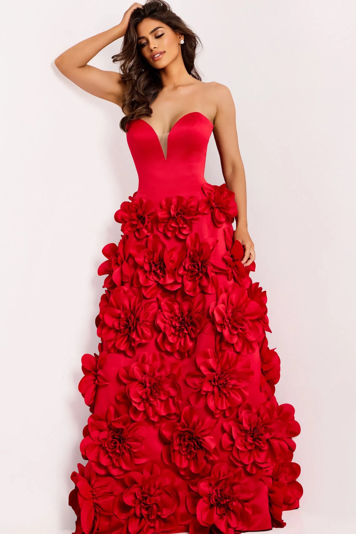 Model wearing Jovani 45661 strapless ball gown featuring a sculpted bodice and dramatic 3D floral skirt.