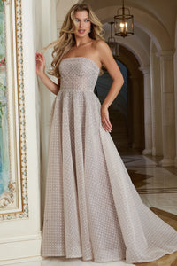 Model wearing Jovani 45788 strapless A-line gown with textured bodice and full flowing skirt, front and back view.