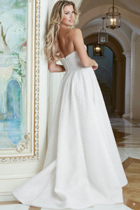 Model wearing Jovani 45788 strapless A-line gown with textured bodice and full flowing skirt, front and back view.