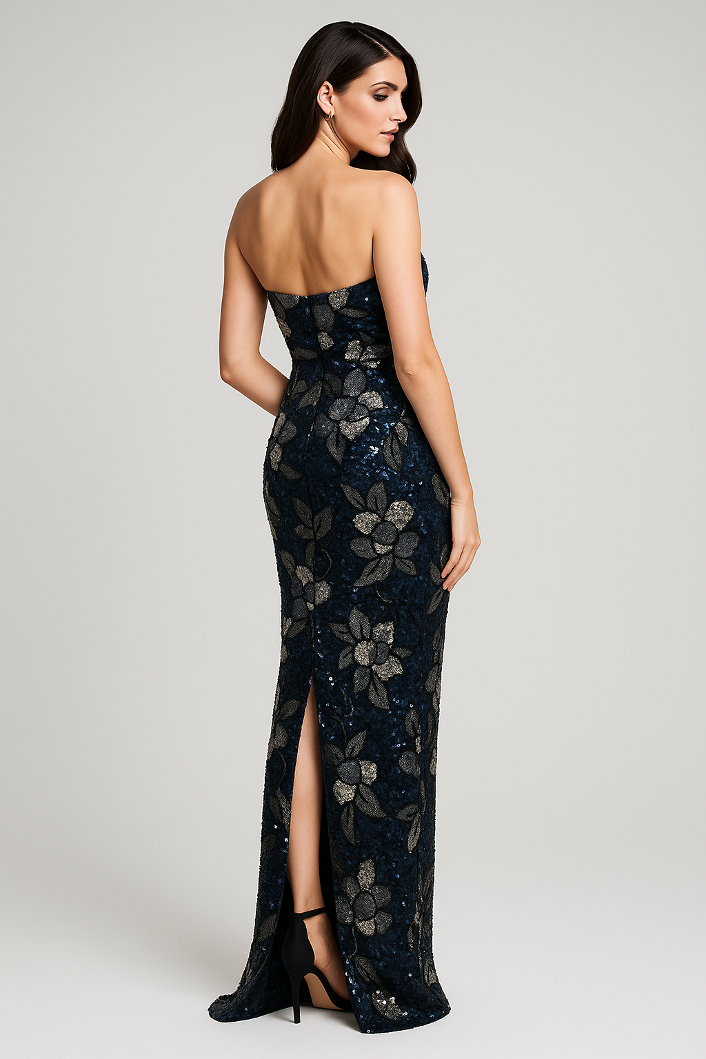 Model wearing Jovani 46431 two-piece column gown with sequin floral detailing, shown strapless and without matching jacket/bolero.  Back View of the dress.