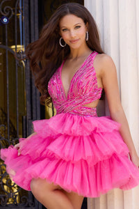Model wearing Jovani 46499 cocktail dress with plunging V-neckline, open crisscross back, and tiered ruffle skirt.