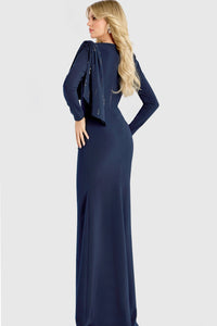 Model wearing Jovani 46738 evening gown featuring a bateau neckline, beaded shoulder detail, long sleeves, and an elegant cape drape.