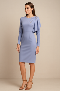 Model wearing Jovani 46739 long sleeve sheath cocktail dress with embellished shoulder drape and fitted silhouette.