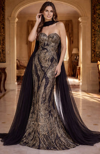 Woman in a glamorous evening gown with a long train in an elegant room.