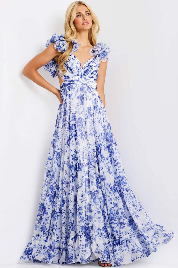 Model wearing Jovani 49143 floral print evening gown with ruffle shoulders, plunging neckline, and flowing full skirt.