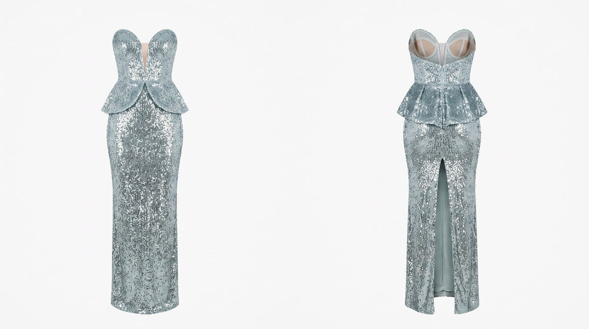 A formal evening gown shown from the front and back on a plain light gray background. The dress is strapless with a sweetheart neckline, a structured peplum waist, and a floor-length silhouette covered in shimmering sequins.