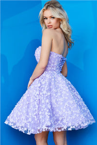 A strapless fit and flare dress with floral appliques, ideal for Bat Mitzvahs, graduations, and homecoming events. Model is wearing the dress in lilac.