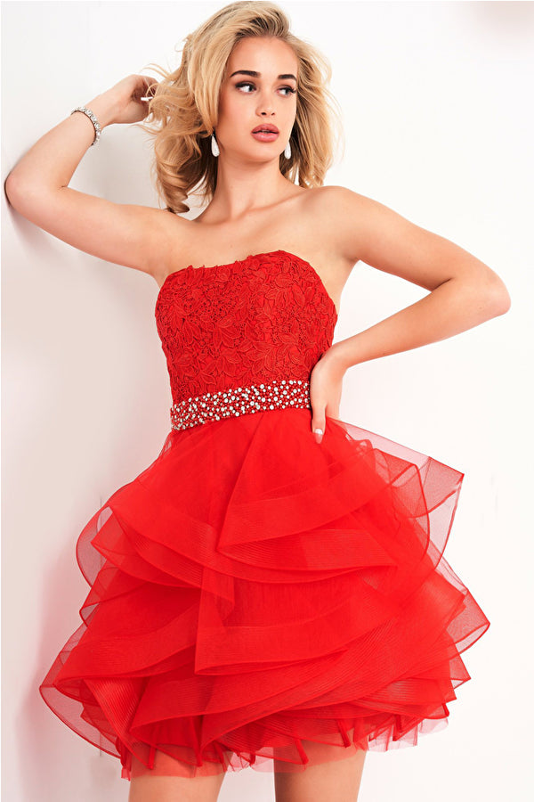 A strapless cocktail dress by Jovani, featuring a floral embellished bodice, an embellished belt, and cascading ruffled layers on the skirt, ideal for cocktail parties and special occasions.