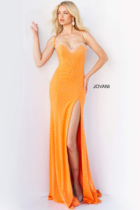 Shine at prom in the JVN07383 by JVN, a fitted jersey dress adorned with heat-set stones. Featuring a high slit and sweetheart neckline, available at Madeline's Boutique in Toronto and Boca Raton, Florida.  The model is wearing the dress in the color orange.
