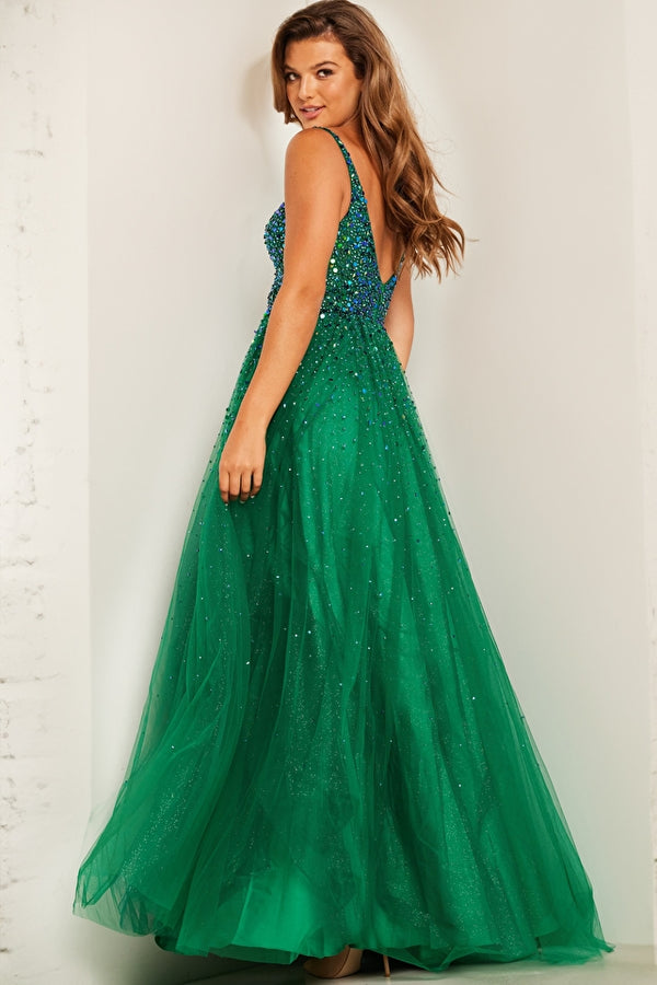 A luxurious embellished A-line prom dress with high slit and V neckline, perfect for prom night. This dress is the color Emerald.