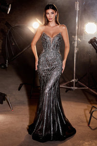 Shine in the spotlight with La Divine CC6018, a stunning evening gown featuring a fitted silhouette, strapless pointed neckline, and dazzling rhinestone embellishments. Perfect for an evening event, this gown promises glamour and sophistication. The model is wearing the dress in black nude.