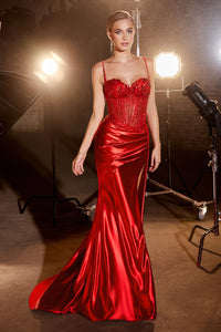 La Divine CD868 Fitted Lace Prom Gown - A sophisticated prom gown featuring a fitted silhouette, ruched waistline, embellished bodice with intricate lace detailing, leg slit, and a side sash that cinches the waist for a stunning look. The model is wearing the dress in the color red.