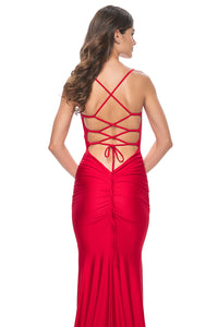 La Femme 31618 Chic Fitted Long Jersey Prom Dress - A sophisticated prom dress with a chic fitted silhouette, ruching detail, criss-cross style bodice, and an open back with a lace-up tie.  Model is wearing the dress in the color red.
