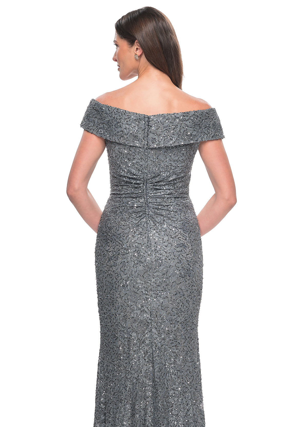 La Femme 31679 Enchanting Beaded Lace Off-the-Shoulder Evening Gown - A breathtaking ensemble featuring intricate beaded lace, off-the-shoulder design, ruching details, and a flattering V neckline for a look of timeless elegance.  The model is wearing the dress in the color gunmetal.  Back View.