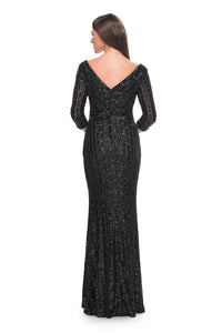 La Femme 31681 Elegant Sequin V-Neck Mother of the Bride/Groom Gown - A vision of elegance with a unique sequin pattern featuring thick lines, V neckline, and three-quarter sleeves for a classic and refined appearance.  The model is wearing the dress in the color black.