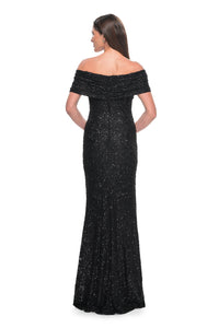 La Femme 31778 Elegant Off-the-Shoulder Lace Evening Gown - A fitted and elegant long dress adorned with exquisite beaded lace, featuring an off-the-shoulder neckline and meticulous ruching.  The model is wearing the dress in the color black.  This is a view of the back of the dress.