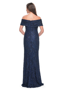 La Femme 31778 Elegant Off-the-Shoulder Lace Evening Gown - A fitted and elegant long dress adorned with exquisite beaded lace, featuring an off-the-shoulder neckline and meticulous ruching.  The model is wearing the dress in the color navy.  This is a view of the back of the dress.