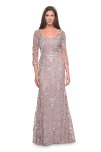 La Femme 31796 Elegant Lace and Beaded Applique Mother of the Bride/Groom Gown - A timeless gown featuring intricate lace and beaded applique, V neckline, sheer illusion lace, and three-quarter sleeves for an elegant and sophisticated look.