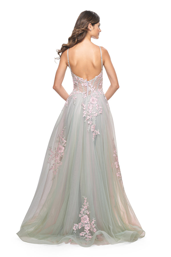 La Femme 31939 Scattered Lace Applique A-Line Prom Gown - An enchanting A-line gown featuring two-color scattered lace applique on tulle, with an illusion waist and boning detail for a magical and captivating prom look. Model is wearing the dress in the color sage.