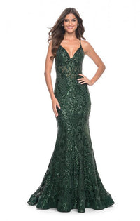 La Femme 31943 Stunning Print Sequin Mermaid Prom Gown - A captivating mermaid gown with a mesmerizing print sequin design, illusion waist, and dramatic open lace-up back.  The picture is of the model wearing the dress in emerald.