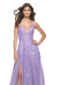 La Femme 32032 Enchanting A-Line Prom Gown - A captivating gown featuring a unique sequin beaded applique, A-line silhouette, V-shaped neckline, and adjustable lace-up back. Ideal for prom night.  Model is wearing the dress in lavender.