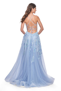 La Femme 32032 Enchanting A-Line Prom Gown - A captivating gown featuring a unique sequin beaded applique, A-line silhouette, V-shaped neckline, and adjustable lace-up back. Ideal for prom night.  Model is wearing the dress in cloud blue.  Back View