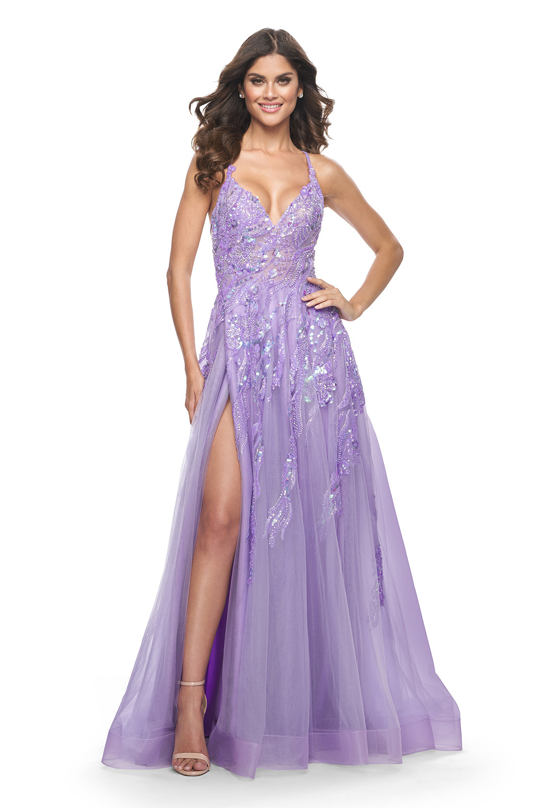 La Femme 32032 Enchanting A-Line Prom Gown - A captivating gown featuring a unique sequin beaded applique, A-line silhouette, V-shaped neckline, and adjustable lace-up back. Ideal for prom night. Model is wearing the dress in lavender.