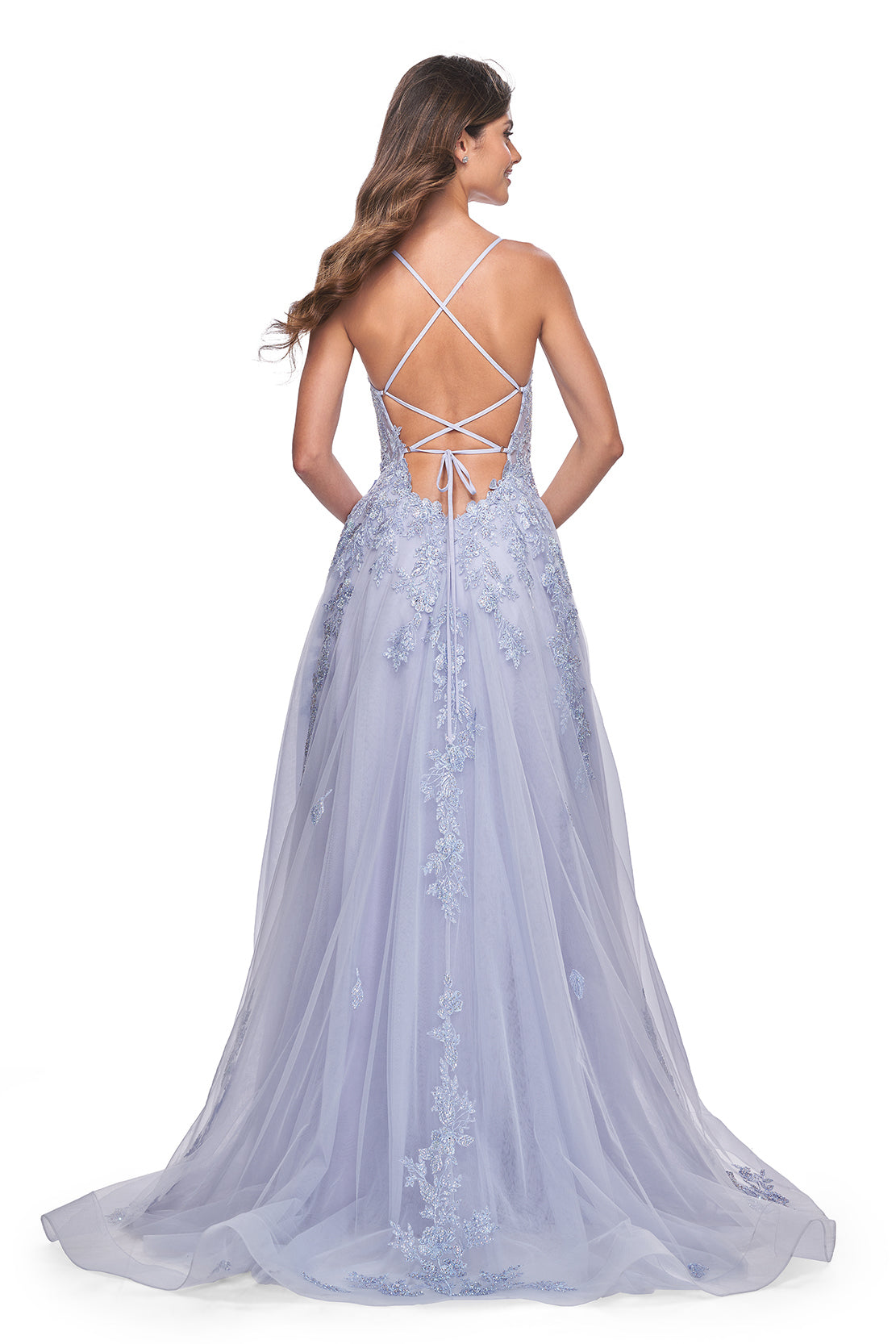 La Femme 32062 A-Line Lace Applique Prom Gown - An enchanting A-line gown featuring a deep v-neck, high slit, lace applique embellished bodice, lace detailed hem, and a charming tie-up back. Perfect for prom or a quinceañera. Model is wearing Light Periwinkle.