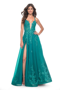 La Femme 32062 A-Line Lace Applique Prom Gown - An enchanting A-line gown featuring a deep v-neck, high slit, lace applique embellished bodice, lace detailed hem, and a charming tie-up back. Perfect for prom or a quinceañera. Model is wearing teal.