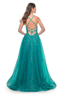 La Femme 32062 A-Line Lace Applique Prom Gown - An enchanting A-line gown featuring a deep v-neck, high slit, lace applique embellished bodice, lace detailed hem, and a charming tie-up back. Perfect for prom or a quinceañera. Model is wearing teal.