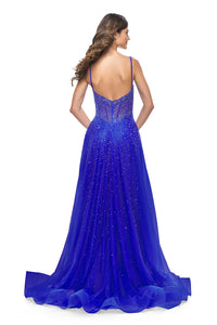 La Femme 32146 Radiant Rhinestone Illusion A-Line Prom Gown - An enchanting prom gown featuring radiant large rhinestones, an alluring illusion bustier bodice, and a V neckline for a dazzling and sophisticated look. The model is wearing royal blue.