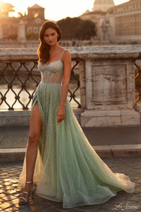 La Femme 32146 Radiant Rhinestone Illusion A-Line Prom Gown - An enchanting prom gown featuring radiant large rhinestones, an alluring illusion bustier bodice, and a V neckline for a dazzling and sophisticated look. The model is wearing sage green.