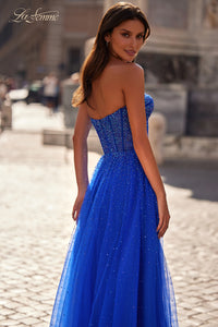 La Femme 32278 - Alluring A-line tulle prom gown with rhinestone embellishments, high slit, and corset illusion details for a glamorous and enchanting look.