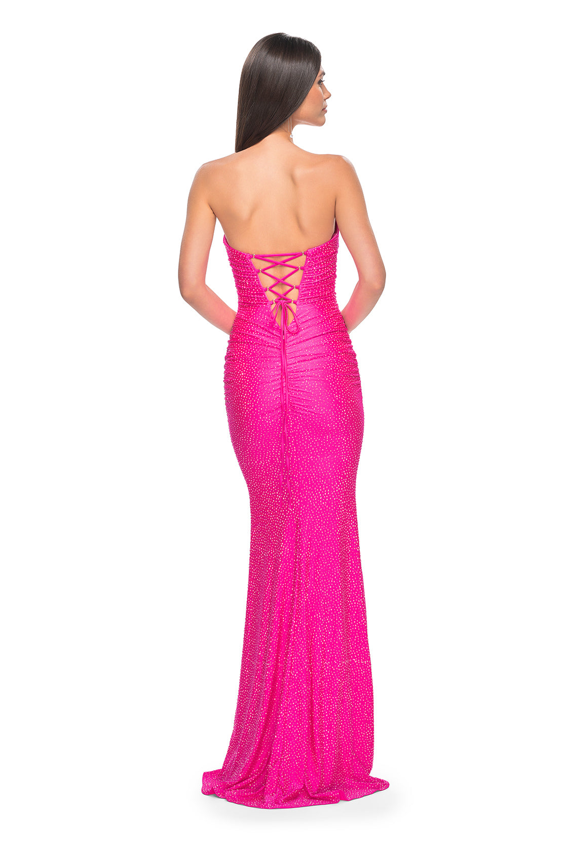 La Femme 32436 Strapless Rhinestone Embellished Prom Gown - A glamorous prom gown with a strapless design, tonal rhinestone embellishments, sweetheart neckline, and a lace-up back for added allure.  Model is wearing neon pink.