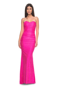 La Femme 32436 Strapless Rhinestone Embellished Prom Gown - A glamorous prom gown with a strapless design, tonal rhinestone embellishments, sweetheart neckline, and a lace-up back for added allure.  Model is wearing neon pink.