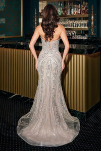 Model wearing Ladivine CC2421 strapless mermaid gown with plunging neckline and detailed symmetrical embellishments.