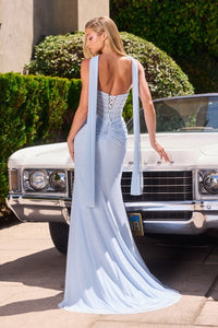 Model wearing Ladivine CD388 gown featuring a draped strapless neckline, sheer corset bodice, and high leg slit.  The model is wearing the dress in Light blue.  Back View.