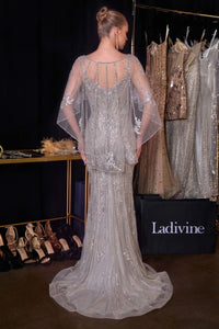 Ladivine CD637 embellished corset gown with sweetheart neckline, intricate crystal beadwork, floral detailing and flowing cape-style sleeves.