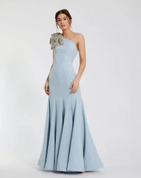 Model wearing Mac Duggal 11810 one-shoulder trumpet gown with flower detail.  Model wearing the dress in the color powder blue.  Front view.