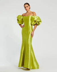 Model wearing Mac Duggal 50677 off-the-shoulder satin gown with puff sleeves, mermaid silhouette, and sweeping train.  Model is wearing the color chartreuse. Front view.