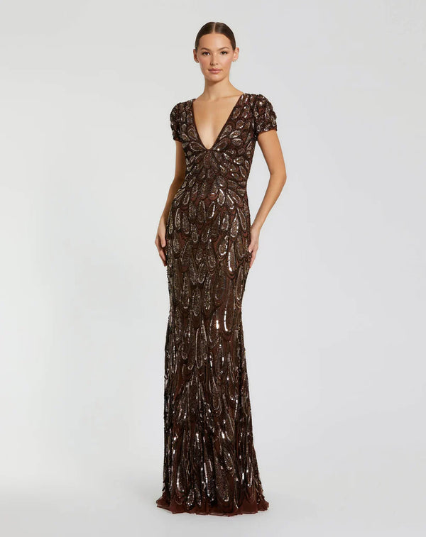 Model wearing Mac Duggal 5243 evening gown with deep V-neckline, cap sleeves, and hand-beaded sequin teardrop pattern.