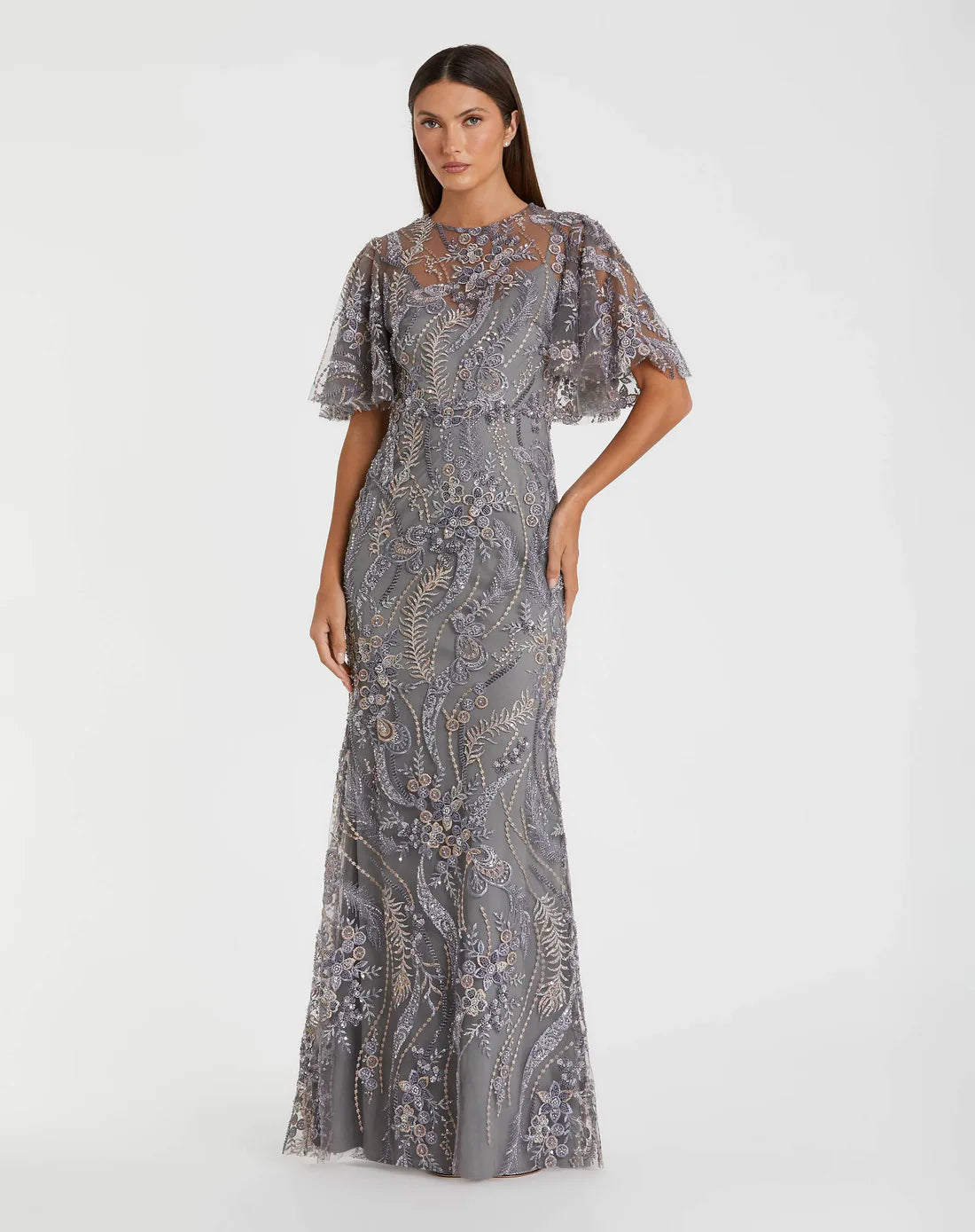 Model wearing the Mac Duggal 68918 gown with a high round neckline, flutter sleeves, allover sequin and beaded detailing, and a trumpet silhouette.