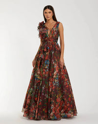 Model wearing Mac Duggal 68947 floral chiffon ballgown with plunging V-neckline, ruffle shoulder detail, and voluminous A-line skirt.  Model is wearing the dress in wine multi.  Front view.