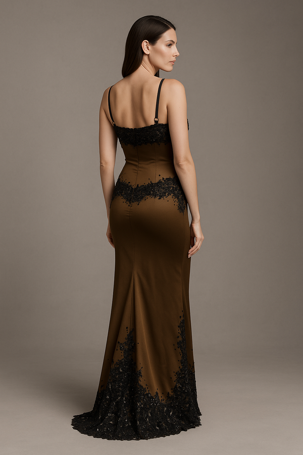 Model wearing Mandalay U01952DEBL embellished fit and flare gown with slim straps, detailed bodice, and floor-length hemline.